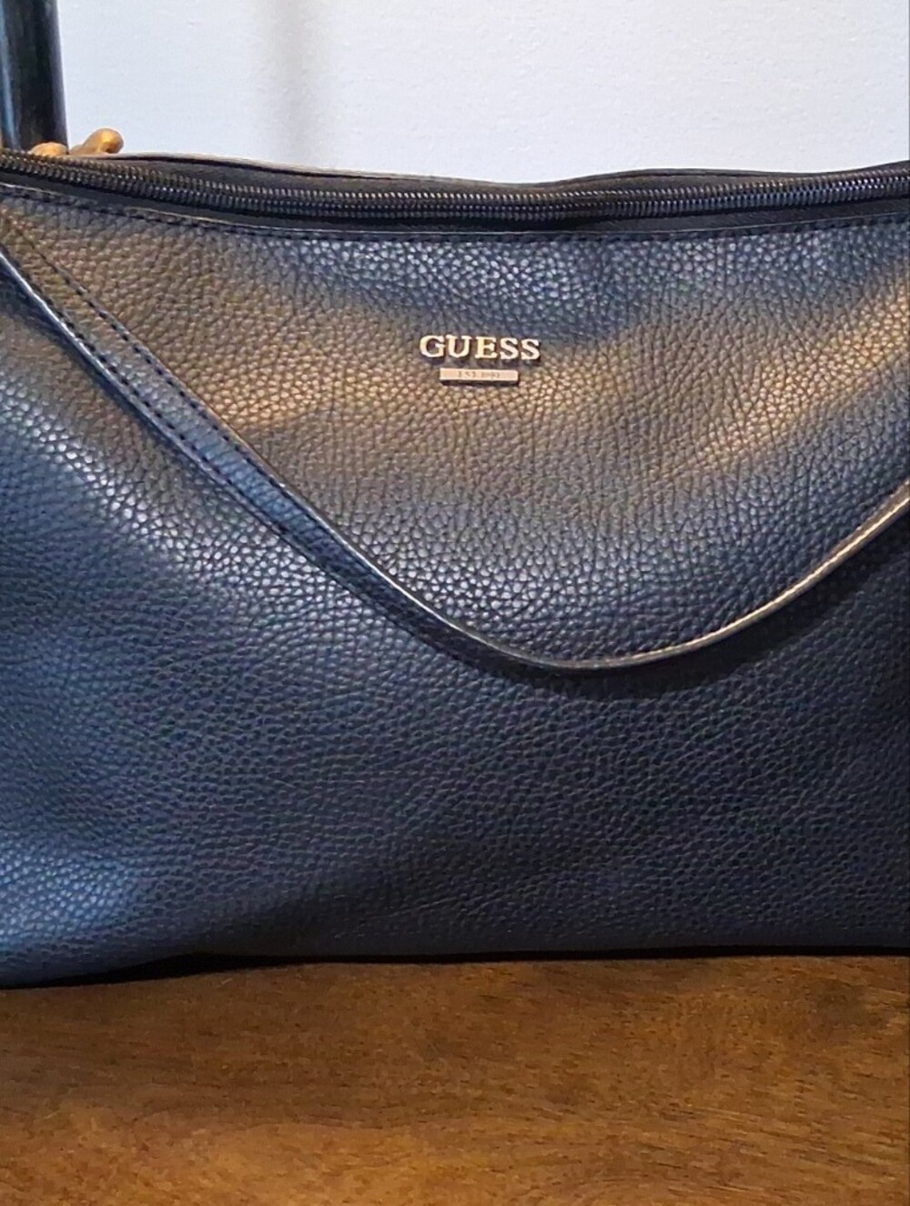 GUESS Black Pebbled Leather Messenger Bag with Gold Logo